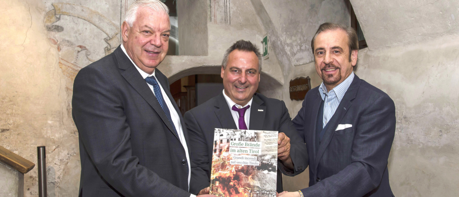 Martin Reiter, Ennio Lappi und Mario Gusmerotti mit Buch